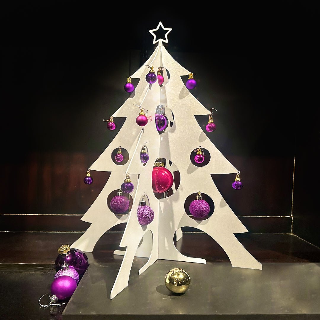 sapin de Noël en métal design brillance polaire
	•	sapin de Noël démontable réutilisable
	•	sapin de Noël en acier Made in France